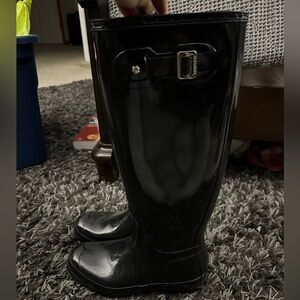 Tall black hunter rain boots